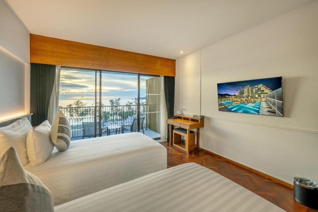 Спальня Deluxe Ocean Twin в Patong Beach Hotel by See2Sea