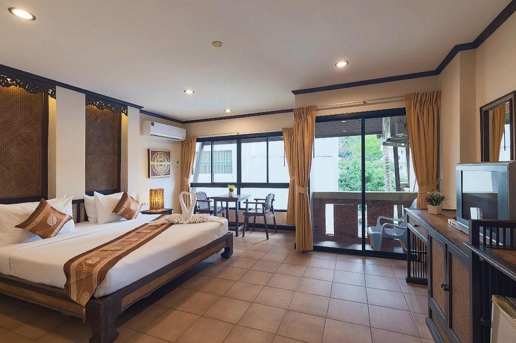 Спальня семейного номера на четверых в Seeka Boutique Resort